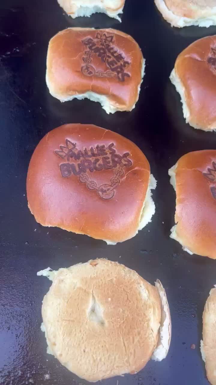 Reel of Mallie's Burgers crew cooking smashburgers on the flat top